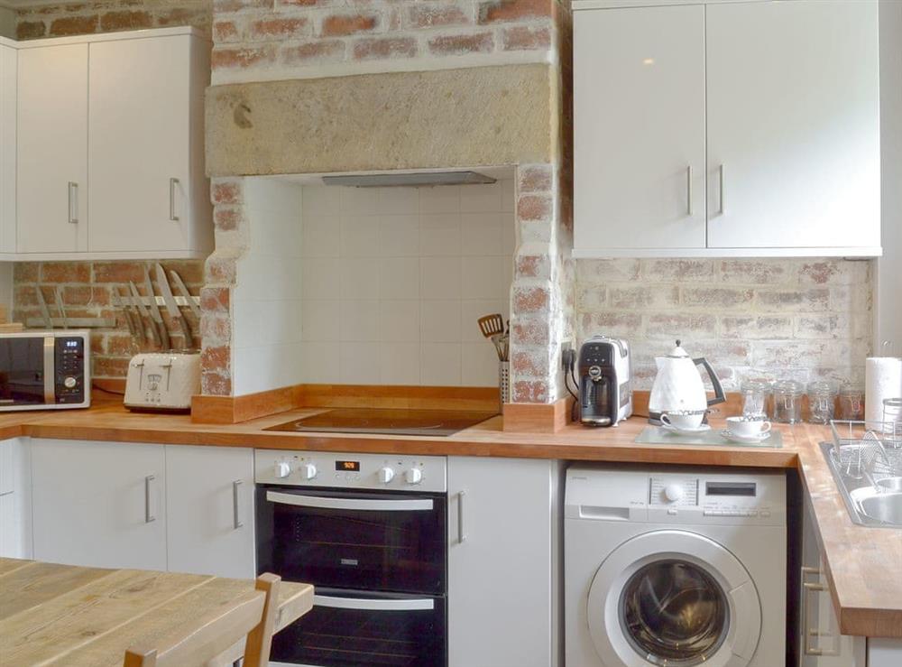 Well equipped kitchen at Pear Tree Cottage in Wirksworth, near Matlock, Derbyshire