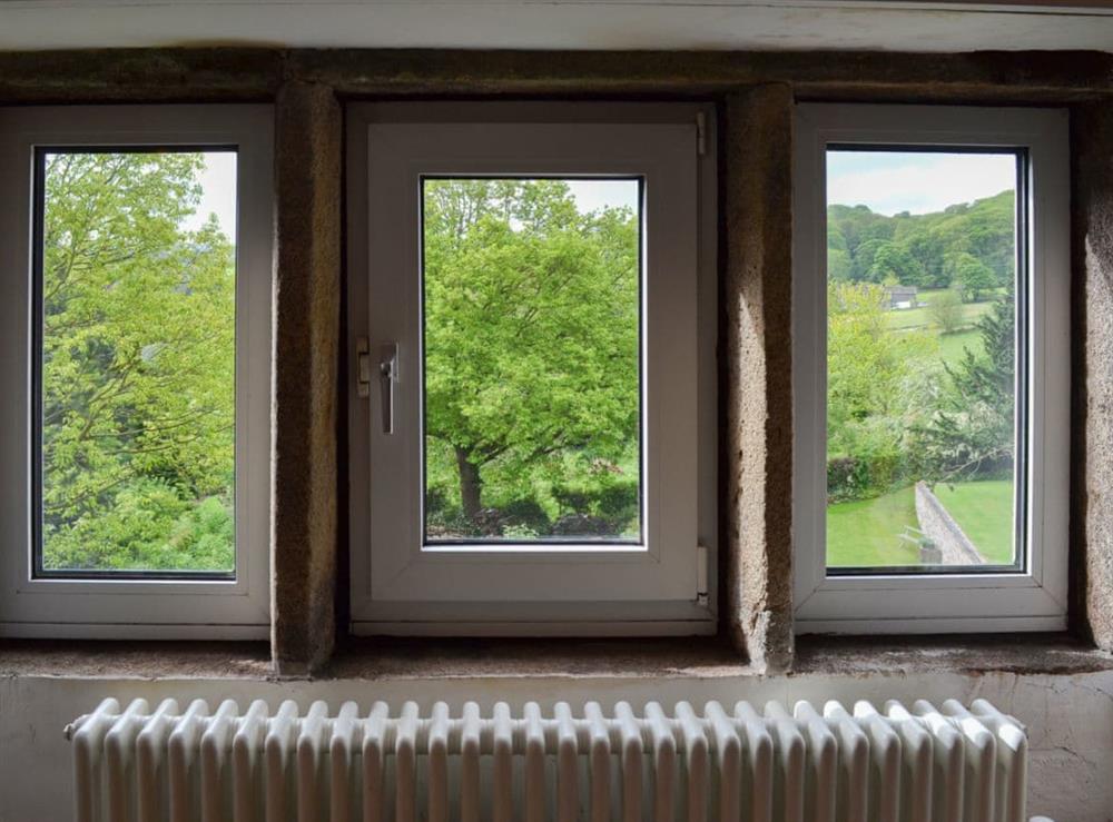 Charming window seat with opriginal mullioned windows at Pear Tree House Annexe in Wooldale, near Holmfirth, Yorkshire, West Yorkshire