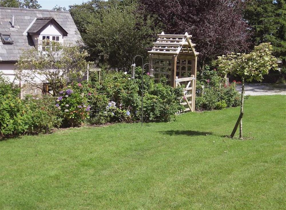 The lush verdant garden at Peartree Cottage in 