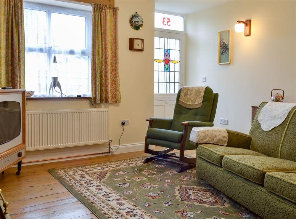 Comfortable living room with authentic 1960’s furniture at Peartree Cottage in Shildon, near Bishop Auckland, Durham