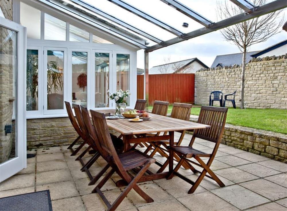 Patio at Pebble Beach Cottage in , Isle of Purbeck