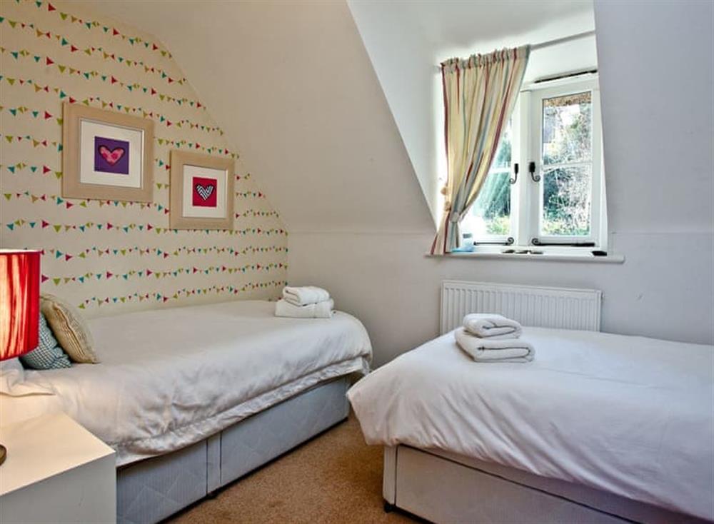 Twin bedroom at Pebble Beach Cottage in , Isle of Purbeck