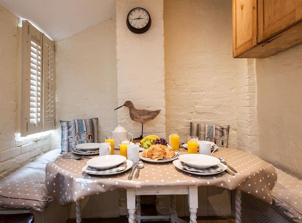 Dining area at Pebble Cottage in Aldeburgh, Suffolk, England