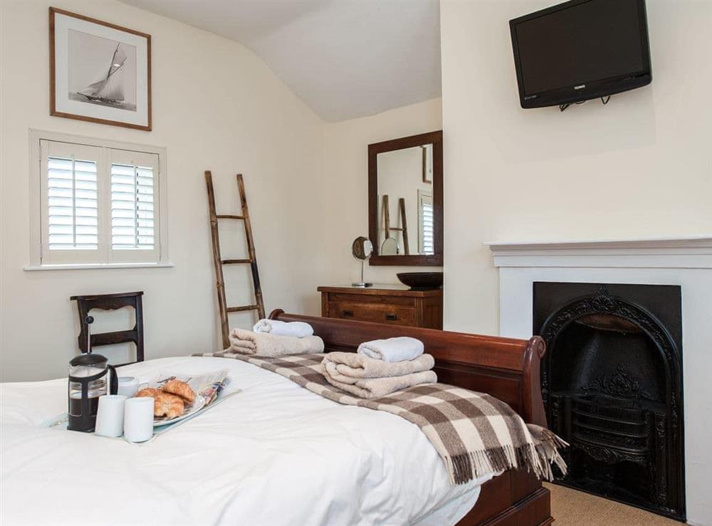 Double bedroom with TV at Pebble Cottage in Aldeburgh, Suffolk, England