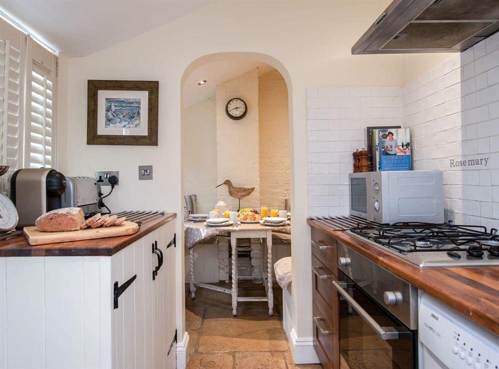 Kitchen & dining area at Pebble Cottage in Aldeburgh, Suffolk, England