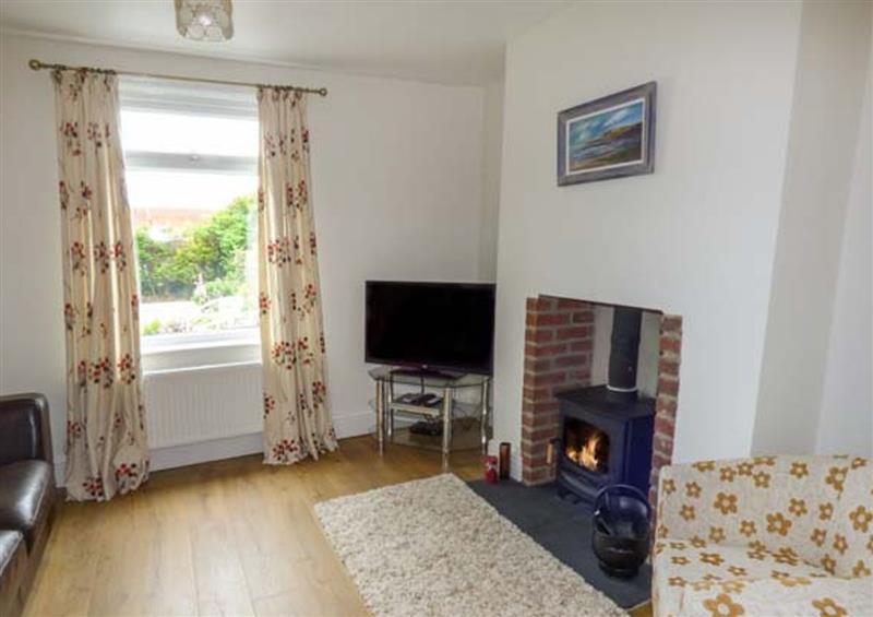Relax in the living area at Pebble Cottage, Hinderwell