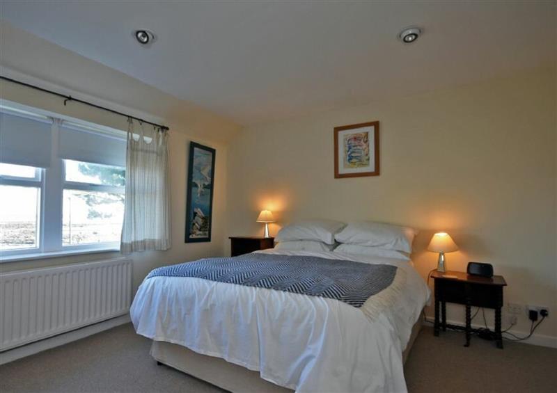 A bedroom in Pebble Cottage at Pebble Cottage, Longhoughton