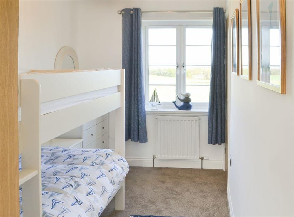 Bunk bedroom at Pebble Cottage in Rock, Northumberland