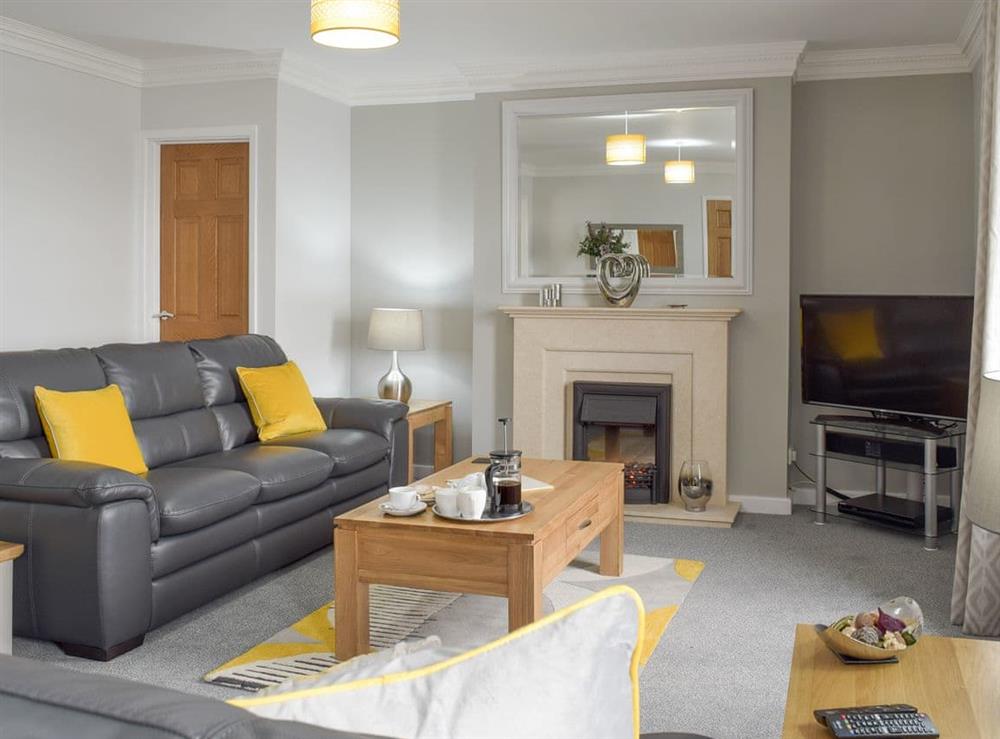 Stylish living room at Pebble Reach in Amroth, near Saundersfoot, Pembrokeshire, Dyfed