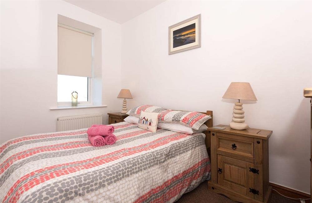 One of the bedrooms at Pebbles at Ocean House in Caernarfon, Gwynedd