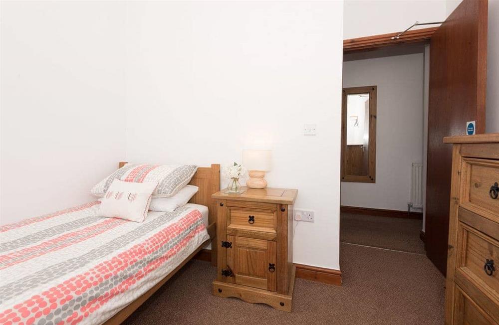 This is a bedroom at Pebbles at Ocean House in Caernarfon, Gwynedd