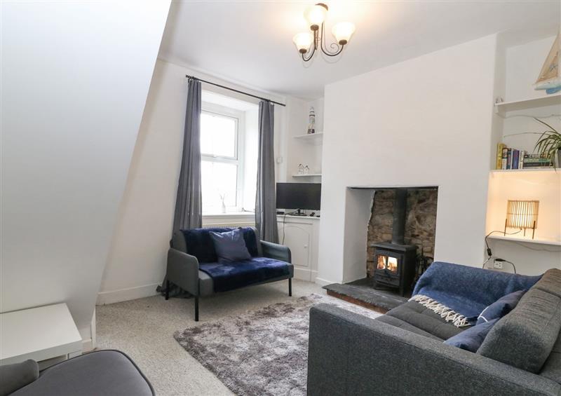 Relax in the living area at Pebblestone Cottage, Llandudno