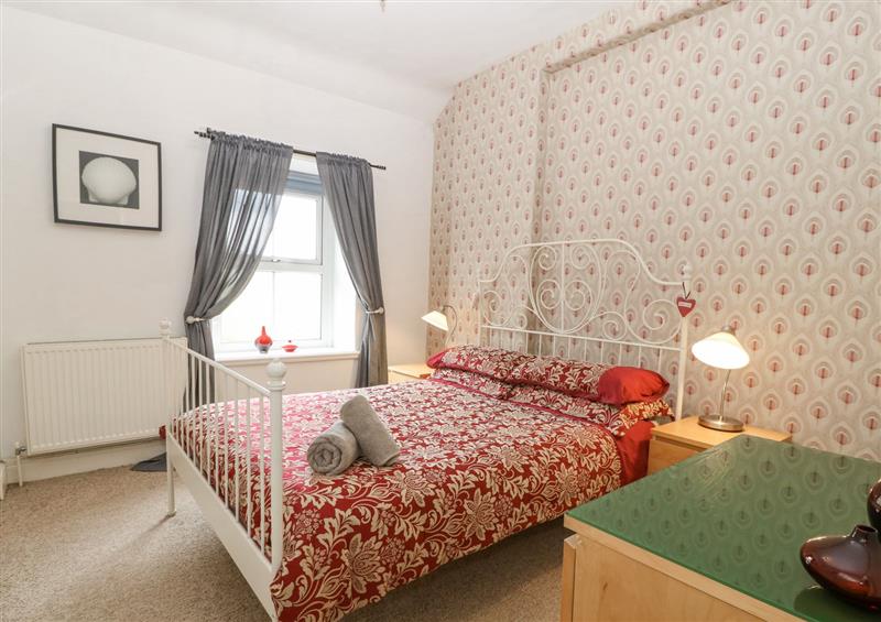 This is a bedroom at Pebblestone Cottage, Llandudno