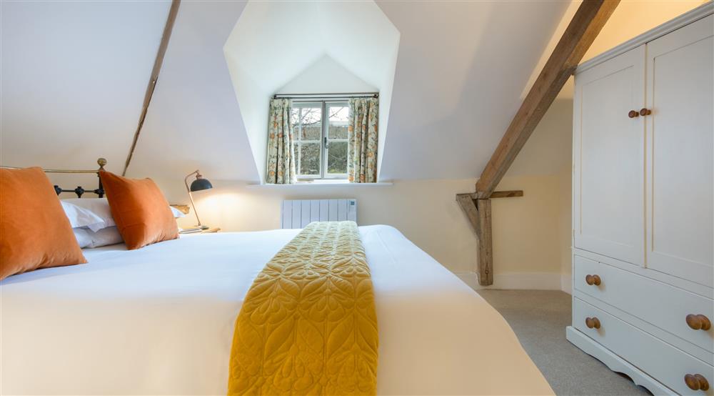 The open-plan bedroom and sitting area at Peckover Stable Lodge in Wisbech, Cambridgeshire