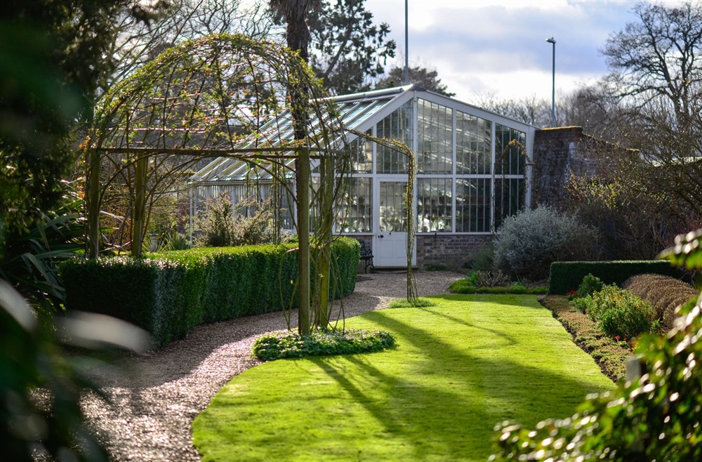 The rear garden in spring at Peckover Stable Lodge in Wisbech, Cambridgeshire