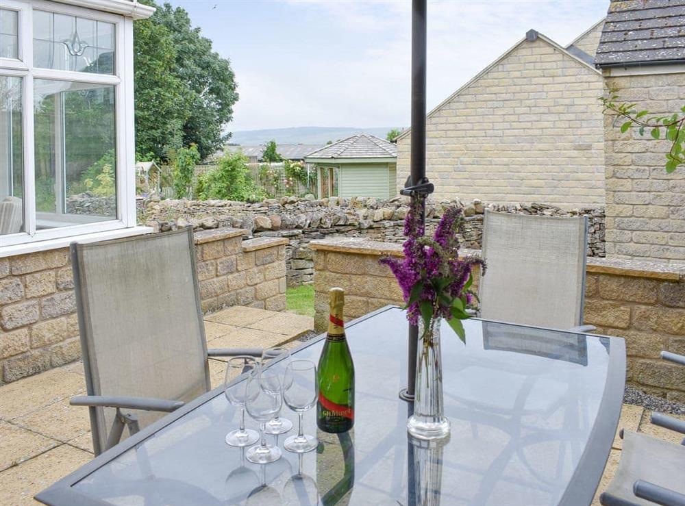Paved patio area with outdoor furniture at Pen Hill View in Leyburn, near Northallerton, North Yorkshire