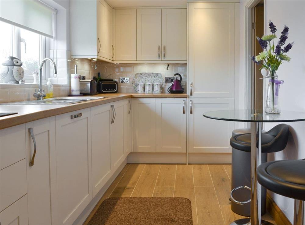 Well-equipped fitted kitchen at Pen Parc in Rhosybol, near Amlwch, Anglesey, Gwynedd