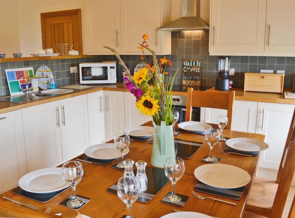 Open plan living/dining room/kitchen (photo 3) at Pen Yr Allt in Llanfaelog, near Rhosneigr, Gwynedd