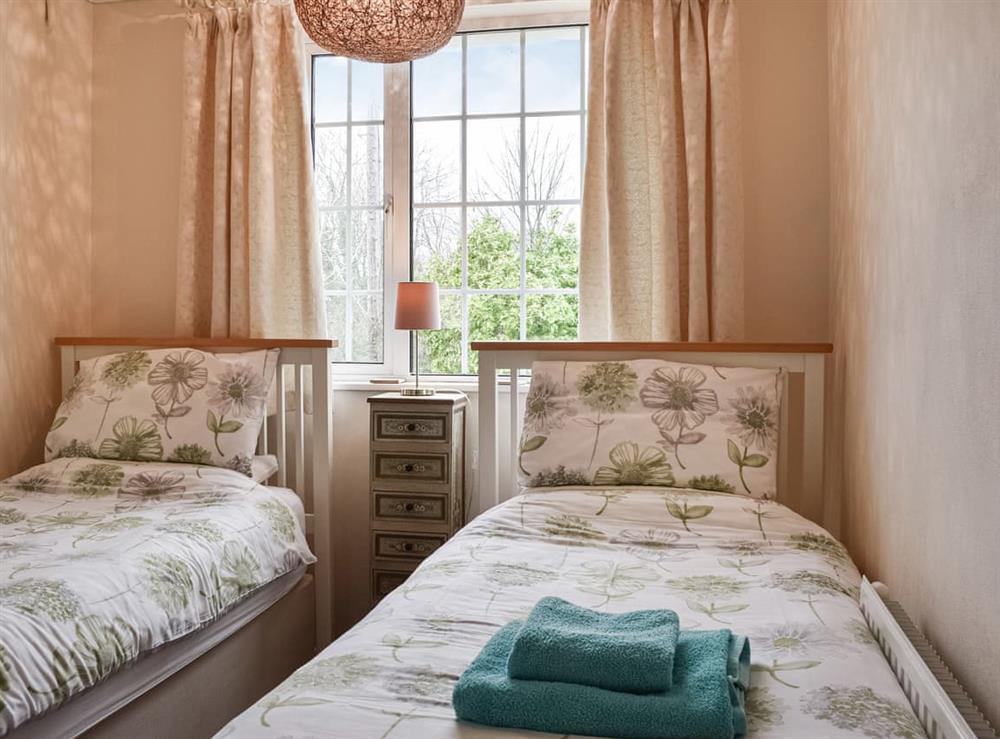 Twin bedroom at Pendavey Lodge in Sladebridge, near Wadebridge, Cornwall