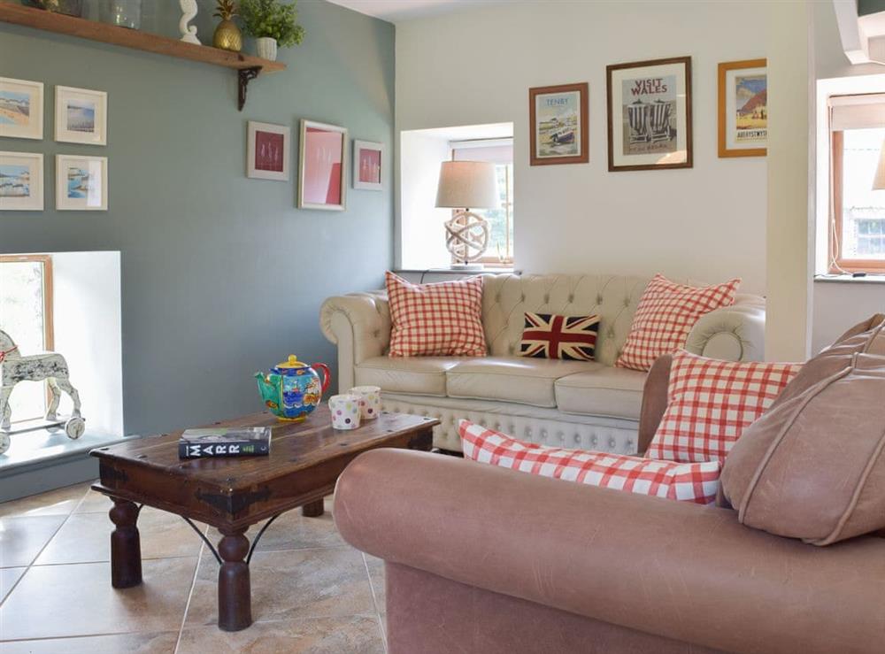 Comfortable living room at Mill Cottage, 