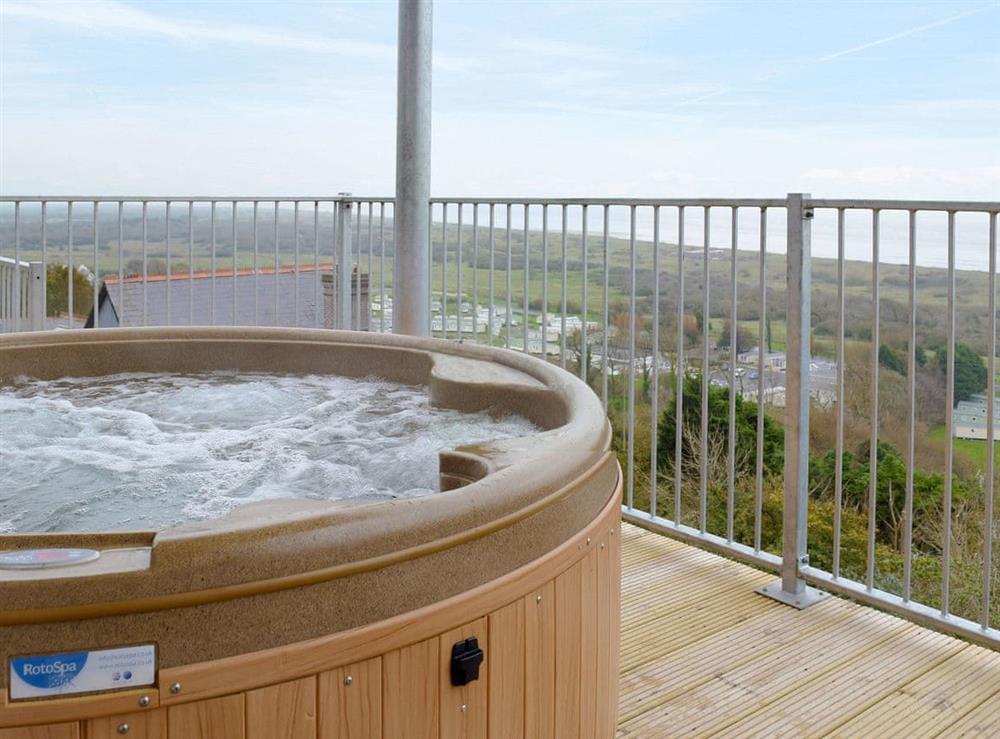 Relaxing private hot tub with breathtaking views at Sea Fairer, 