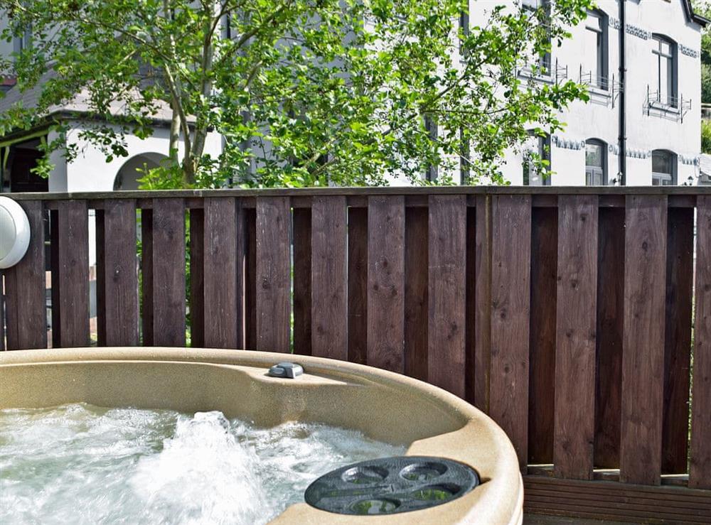 Inviting hot tub area (photo 2) at Pendine Manor in Pendine, near Laugharne, Dyfed