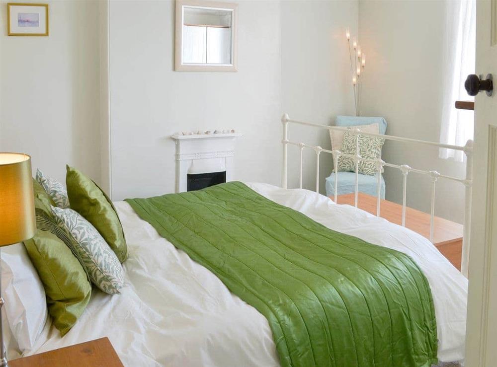 Comfortable double bedroom at Pendragon Cottage in Tregatta, near Tintagel, Cornwall