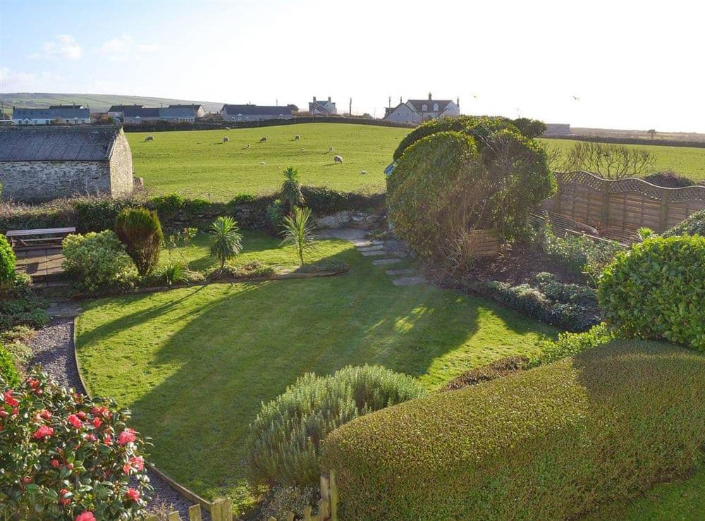 Views overlooking the garden and surrounding area at Pendragon Cottage in Tregatta, near Tintagel, Cornwall