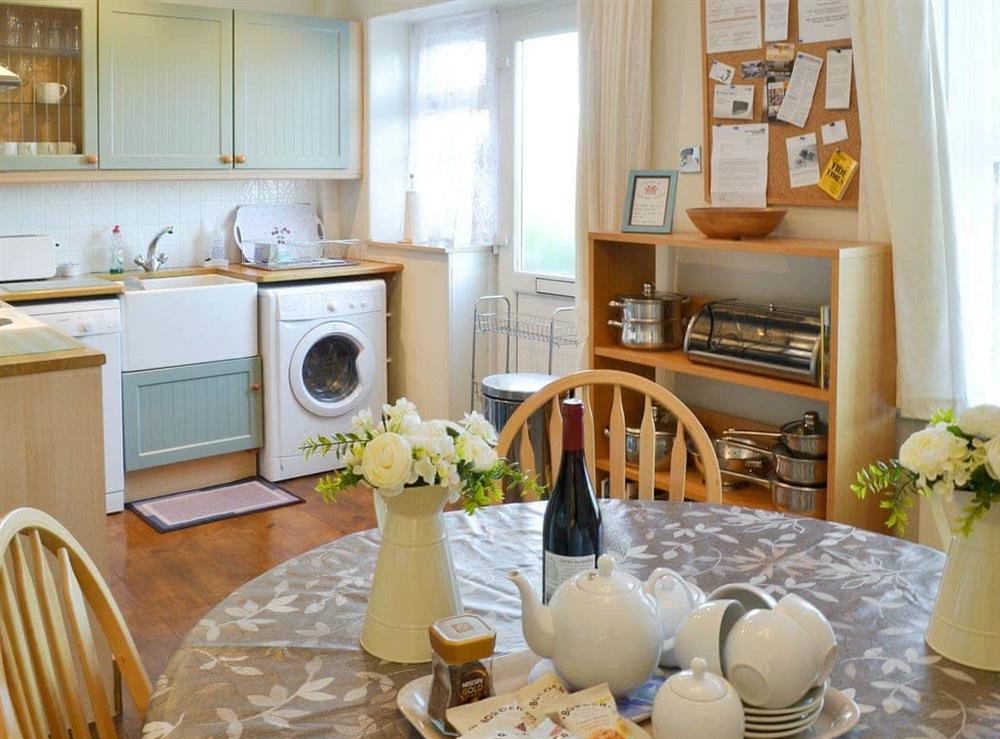 Well equipped kitchen/ dining room at Pendragon Cottage in Tregatta, near Tintagel, Cornwall