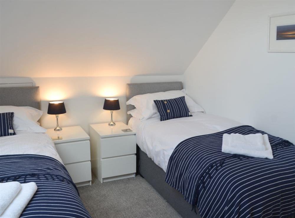 Twin bedroom at Penfose Apartment in Mevagissey, Cornwall