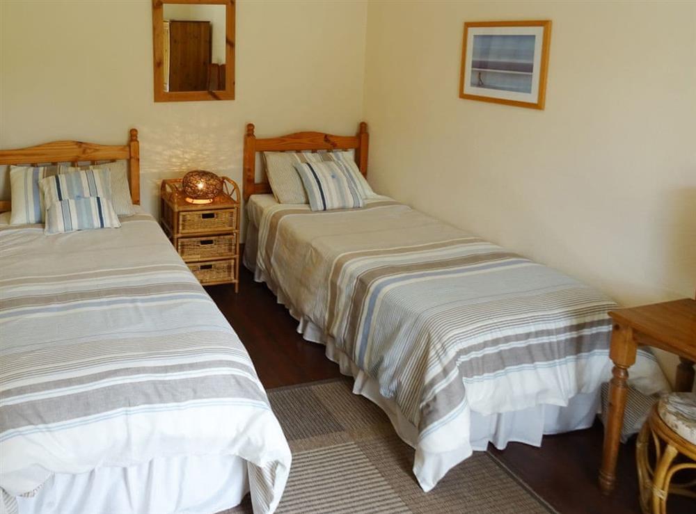 Comfortable twin bedroom at Penfound Country Cottage in Poundstock, near Bude, Cornwall