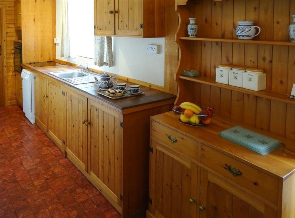 Well-equipped fitted kitchen at Penfound Country Cottage in Poundstock, near Bude, Cornwall
