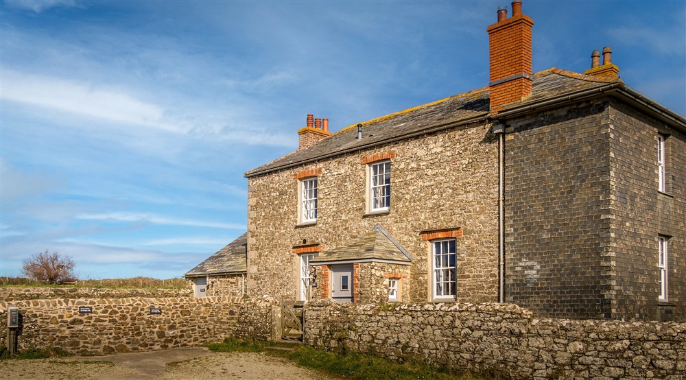 The exterior of Pengirt, with neighbouring Pentire Head Farmhouse to the right, Cornwall at Pengirt in Polzeath, Cornwall