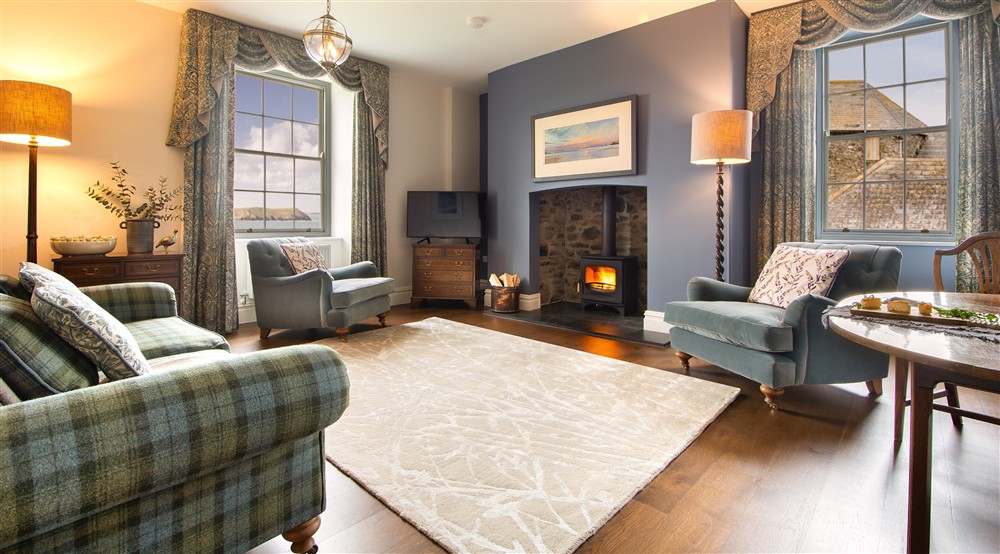 The sitting room, with a sea view, at Pengirt in Polzeath, Cornwall