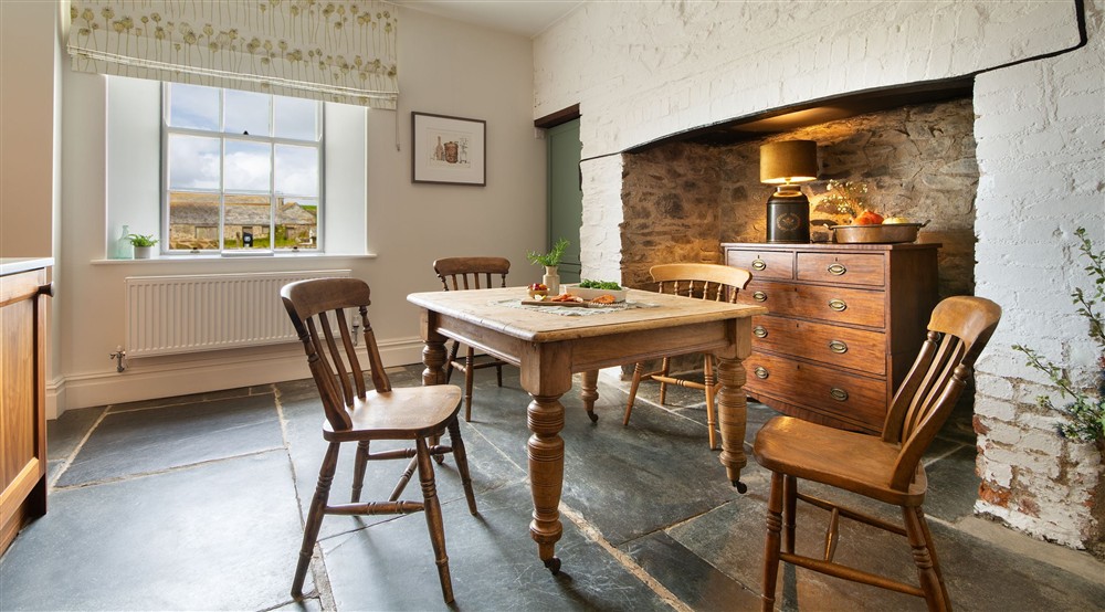 The table for four in the kitchen (photo 2) at Pengirt in Polzeath, Cornwall