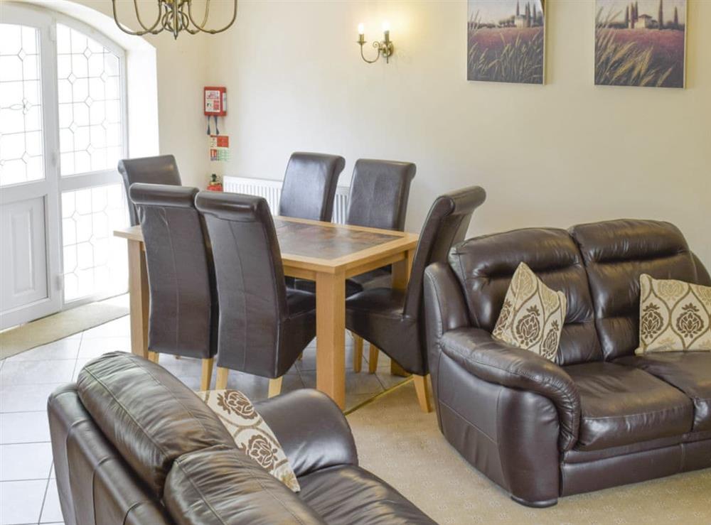 Convenient dining area within open plan designed living space at No 1 Pengraig Draw, 