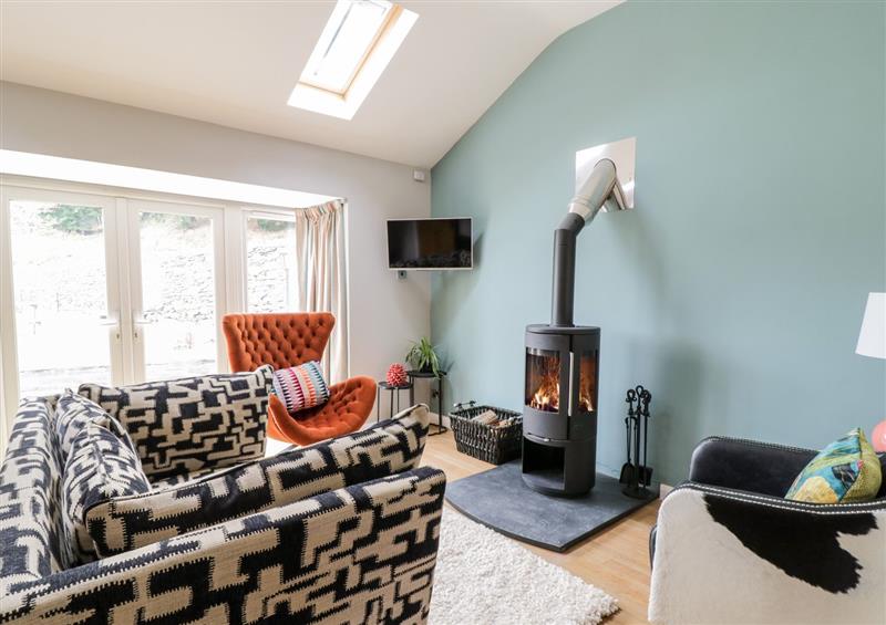 Relax in the living area at Pengwern Bach, Llanrwst
