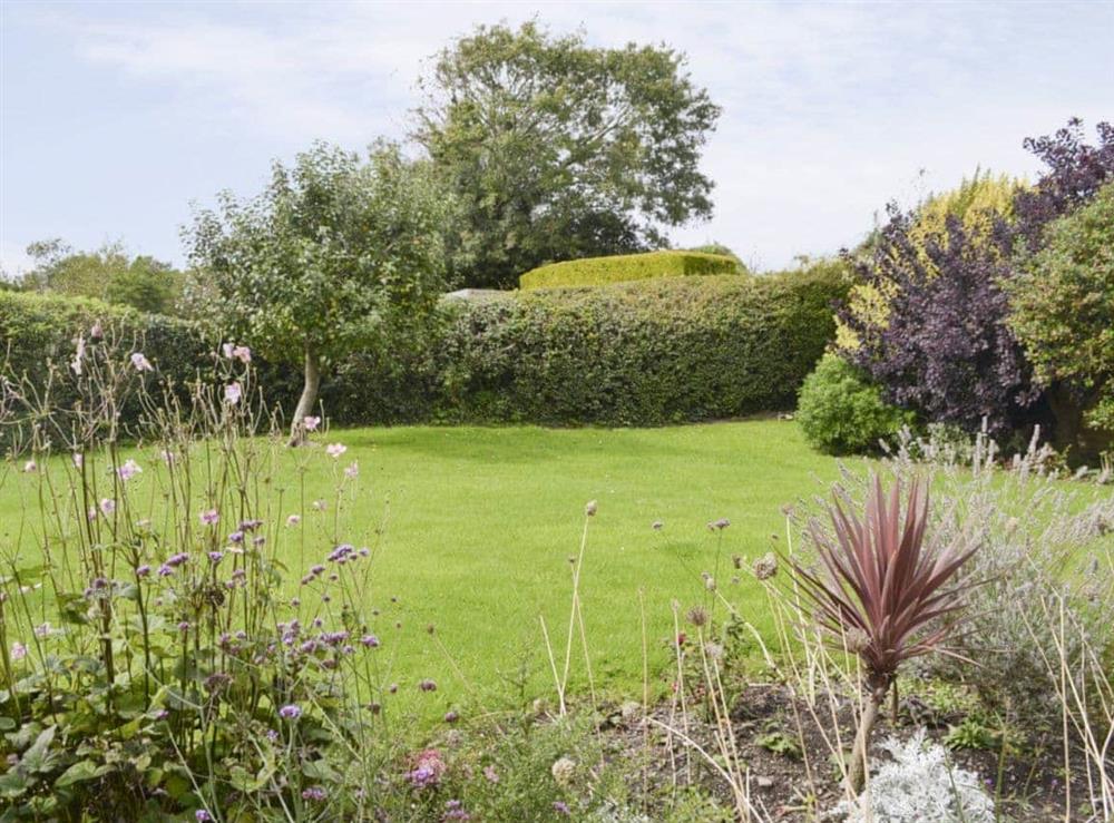 Well-maintained garden at Penhill Farm Cottage in Fremington, near Barnstaple, Devon
