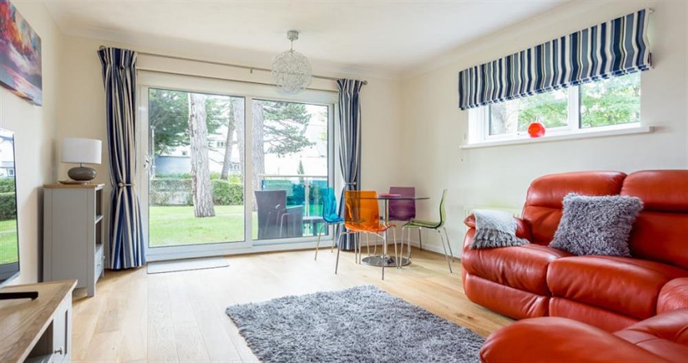 Relax in the living area at Peninsula Court No.1 in Sandbanks
