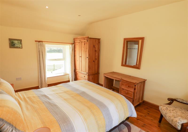 A bedroom in Penllyn at Penllyn, Newborough