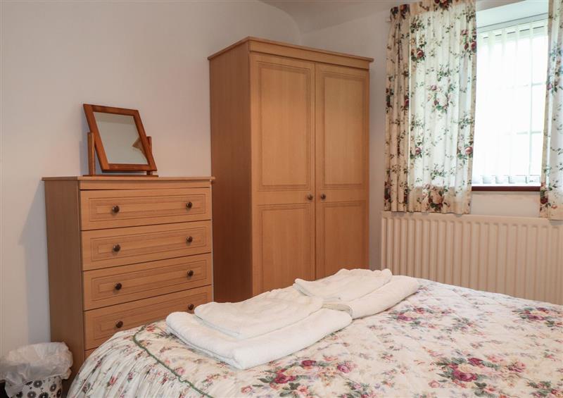 A bedroom in Penlon Cottage at Penlon Cottage, Trefor