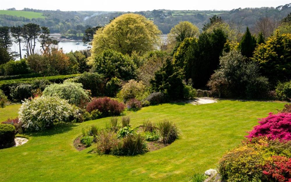 Part view of the garden from the house. at Penmorva in Helford Passage