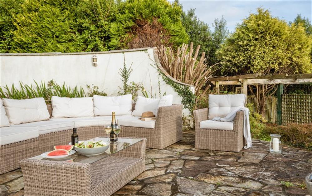 Plenty of outside seating to enjoy the views over the garden and river. at Penmorva in Helford Passage