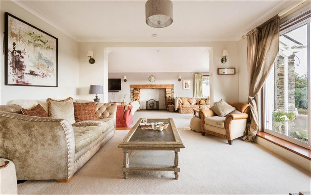 The family room leads into the large lounge. at Penmorva in Helford Passage