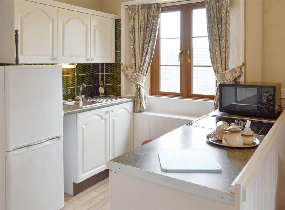 Well-equipped fitted kitchen at Hayloft, 