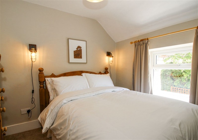 A bedroom in Pennal Cottage (photo 2) at Pennal Cottage, Maesbury Marsh near Knockin