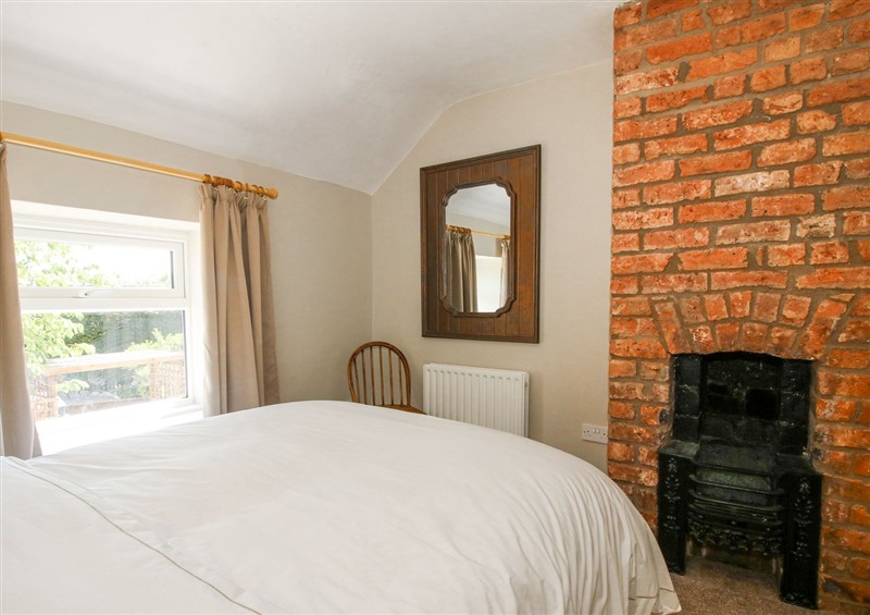 A bedroom in Pennal Cottage (photo 3) at Pennal Cottage, Maesbury Marsh near Knockin