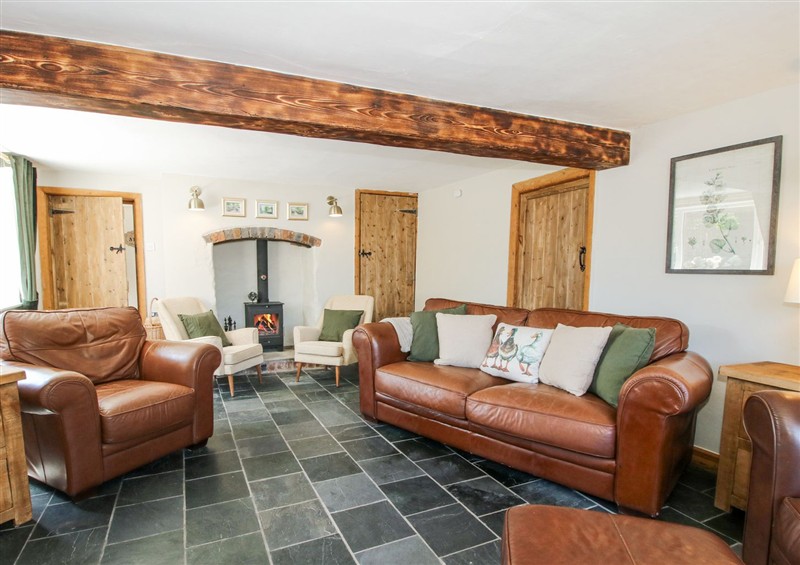 The setting of Pennal Cottage at Pennal Cottage, Maesbury Marsh near Knockin