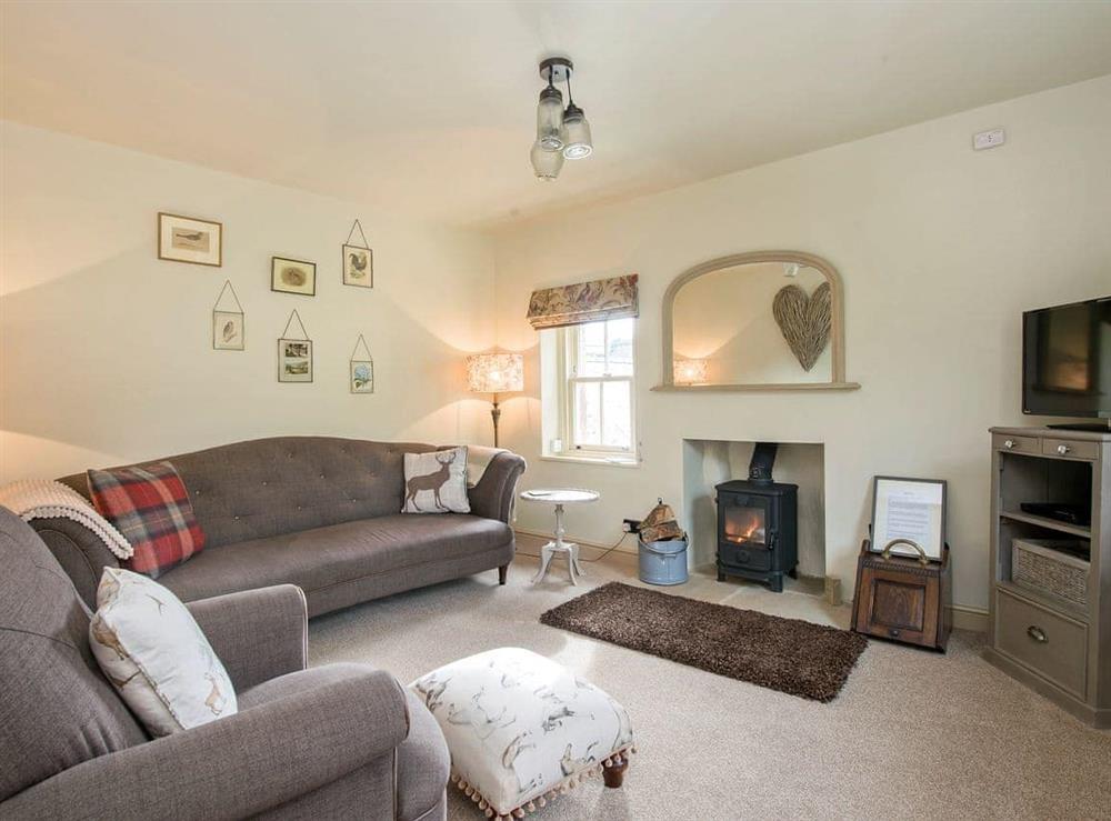 Exquisite soft furnishings and furniture in living room at Penny Cottage in Bonsall, near Matlock, Derbyshire