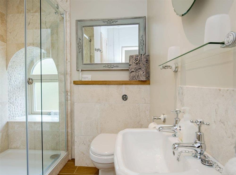 Shower room with double cubicle and toilet at Penny Cottage in Bonsall, near Matlock, Derbyshire
